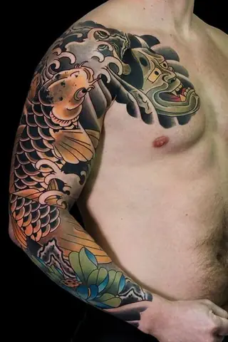 Hình Xăm Mặt Quỷ Cá Chép Ở Tay Cho Nữ